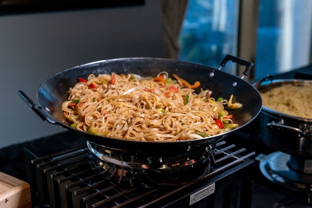 Why Chinese Restaurants Keep Their Woks Scorching Hot